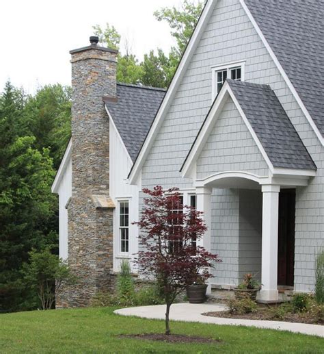 metal roofs on gray house|gray homes with black roofs.